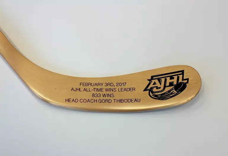 Behrends-Group-slider-projects-custom-bronze-hockey-stick-03-770x528px