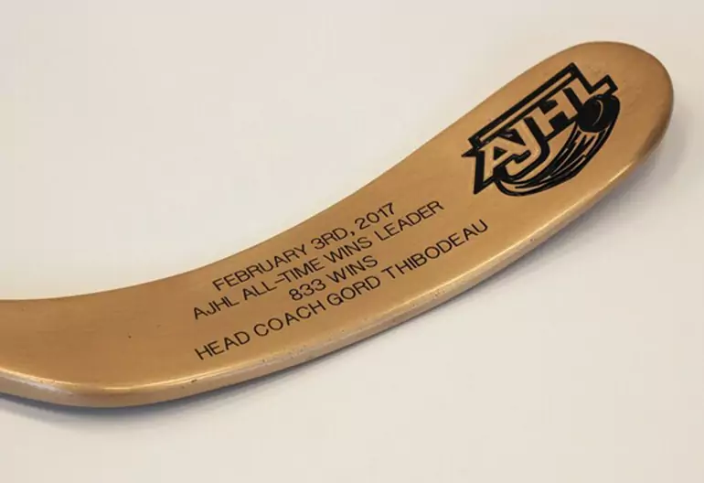 Behrends-Group-slider-projects-hero-custom-bronze-hockey-stick-01-770x528px